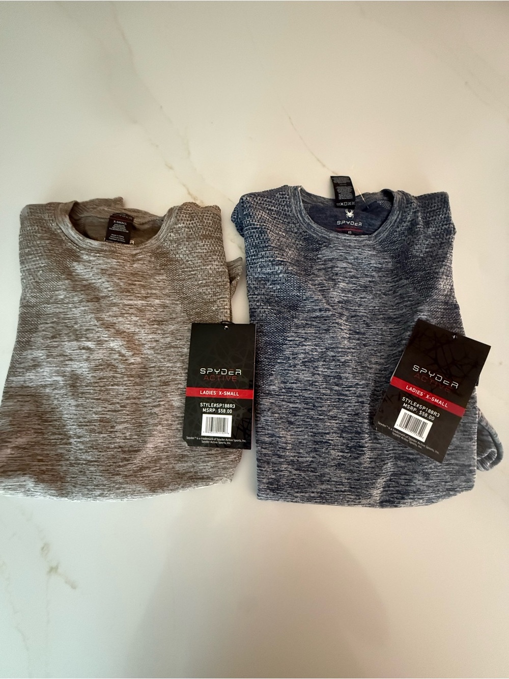 set of 2 Spyder seamless long sleeve tops , NWT SZ xS